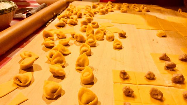 Learn how to make tortellini from scratch and enjoy the rich and decadent flavors of Italian food in Italy.